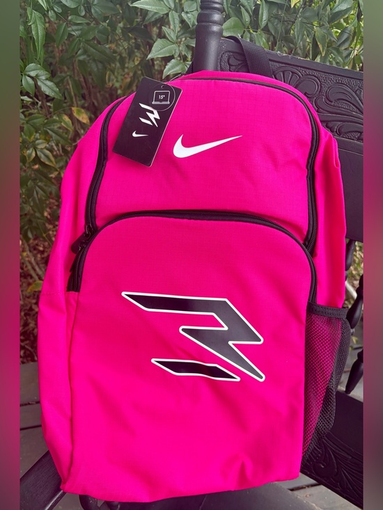 Nike Handbags - NWT NIKE Women's Pink Everyday Backpack with mesh water bottle holder